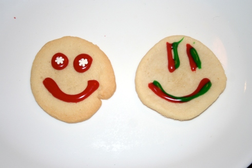 Holiday cookies. Aunt Smiley on the left; Uncle Smiley on the right.